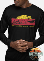 Man wearing our 50,000 years of Aboriginal culture longsleeve t-shirt in the colour black. The design is Uluru in the colours of the Aboriginal Flag.