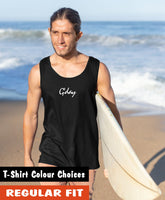 Man on beach carrying surfboard wearing our black singlet with G'day written in white on the front.